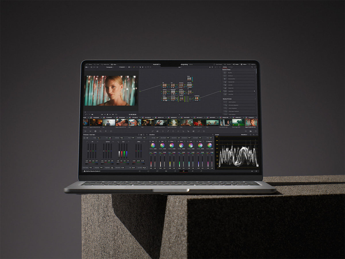 HueCraft professional color grading tools displayed in DaVinci Resolve on a MacBook
